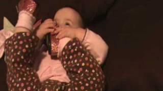 Avery Giggling on bed