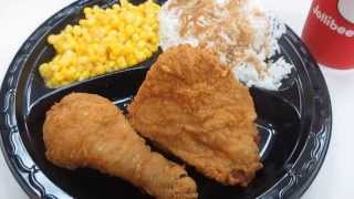 Jollibee chickenjoy fried chicken with corn, rice, and gravy on
mission street in daly city, california.