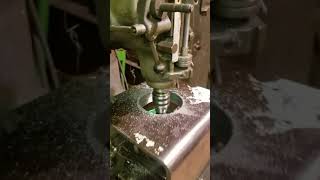 Cutting a 5 inch hole in 1 1/2 inch thick mild steel.