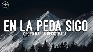 Grupo Marca Registrada - En La Peda Sigo (Letra/Lyrics)