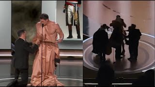 John Cena Undergoes Quick Wardrobe Change After Naked Oscars Moment is actually caught on camera