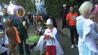 Thousands take over SF street where residents threw a Halloween party for children