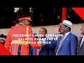 President Uhuru Kenyatta salutes NASA leader Raila Odinga