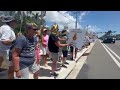 Scenes from "Hands Off!" rally against the Trump Administration in Naples, Florida