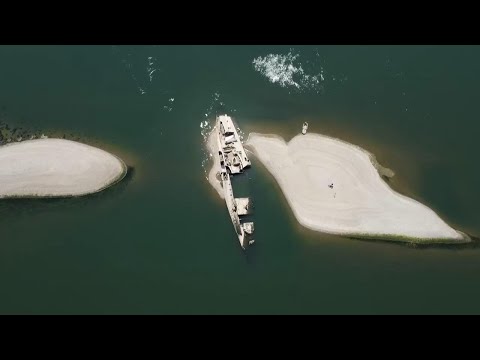 Sunken WWII era ships appear as Danube levels go down amid drought