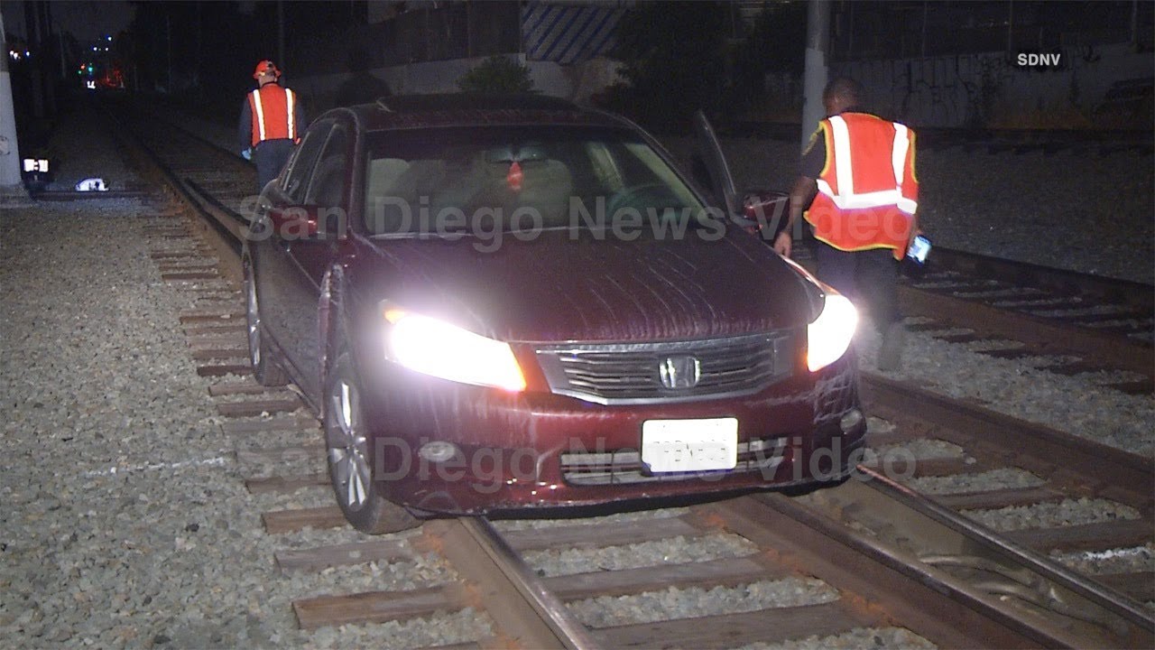 Driver arrested after driving car on trolley tracks during police chase ...