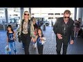 Along With Tons Of Luggage, Johnny Hallyday Takes His Dog Onboard Too