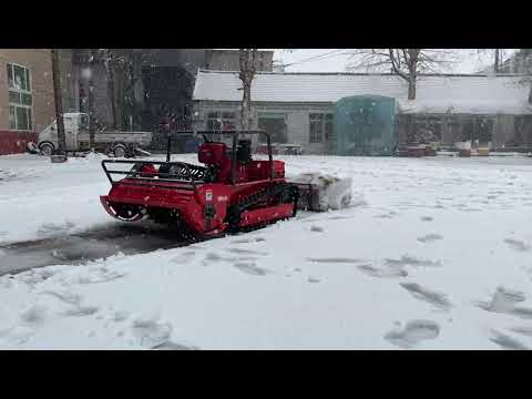 Remote control crawler mower rear snow plow attachment test