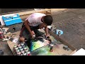 Amazing spray painting at the street