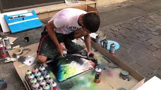 Amazing spray painting at the street