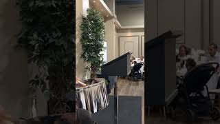 Trenyce playing for a reception event
