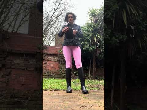 Outfit of the day equestrian riding boot, pink jodhpurs, coat & vintage riding hat