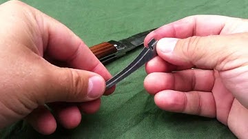 Mikov knife spring disassemble.