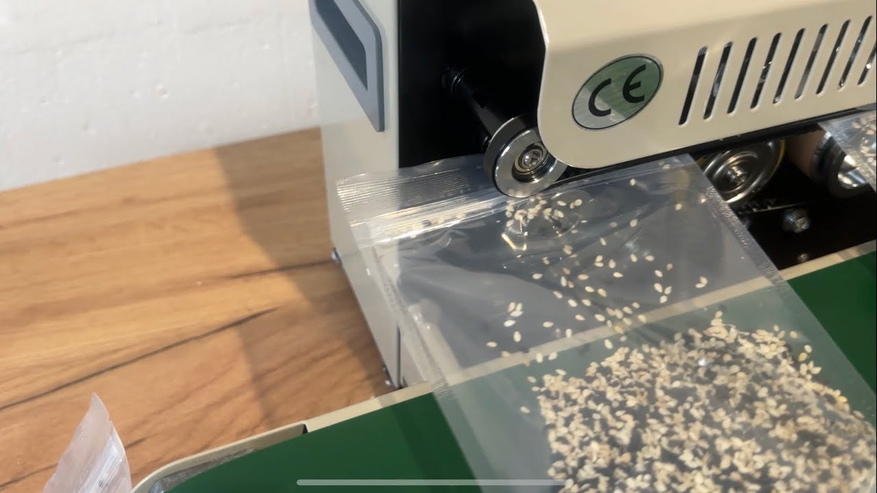 Роликовий запайщик постійного нагріву з конвеєром Hualian FRB-770I