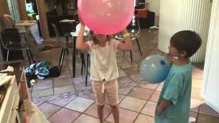 Blowing up a big balloon thingy￼