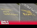 Vile racist 'stop the boats' graffiti sprayed onto Scots country road