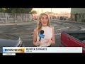 LA County firefighters extinguish flames burning Vernon warehouse
