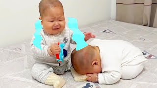 Cute Twin Brothers Momentthe Younger Brother Treats His Twin Brothers Feet As Toys