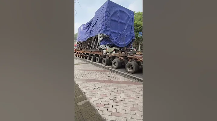 Giant trucks are moving through the city #machine #viralvideo #truck #excavator #amazing