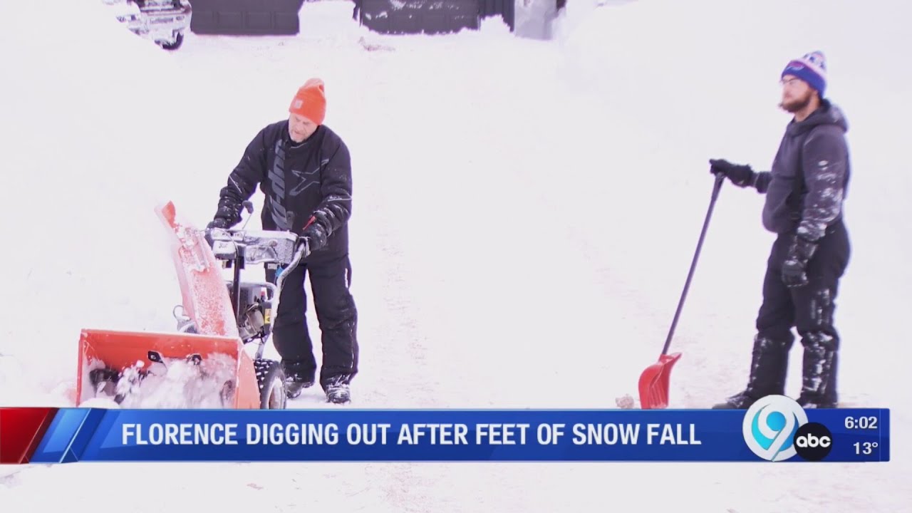 Florence digging out after feet of snow fall - YouTube