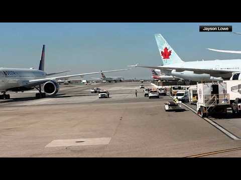FAA investigates after a Delta plane clipped an Air Canada plane