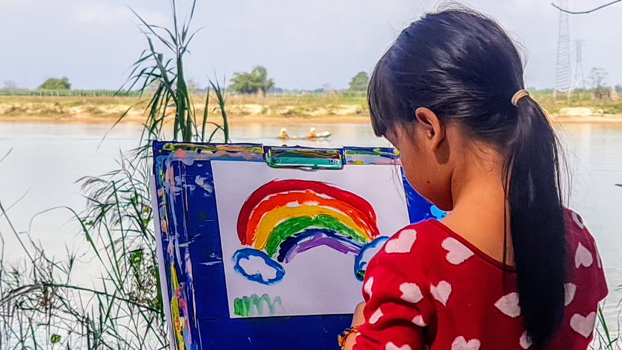 4-year-old kid artist painting a rainbow & singing next to a river | Acrylic painting | Mia Mai Art