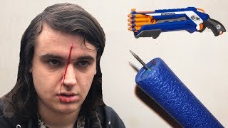 SHOOTING MYSELF W/ THUMBTACK NERF DARTS