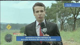 Bandidos fazem reféns de escudo humano em assalto a banco