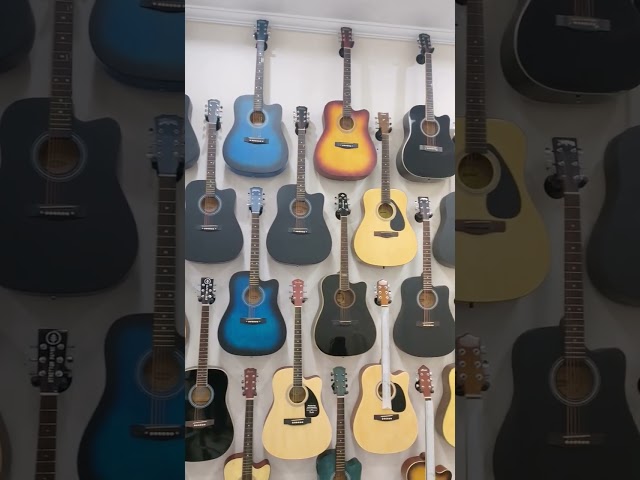 Music instruments Shop name Music Mart Cavalry Shop Lahore Pakistan class=