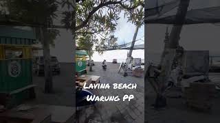 Enjoying Beautiful Lavina Beach In Bali Indonesia At Sunset.