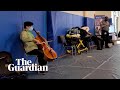 Yo-Yo Ma plays cello in vaccine waiting room in Massachusetts