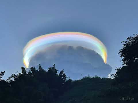An Iridescent Pileus Cloud over China #shorts