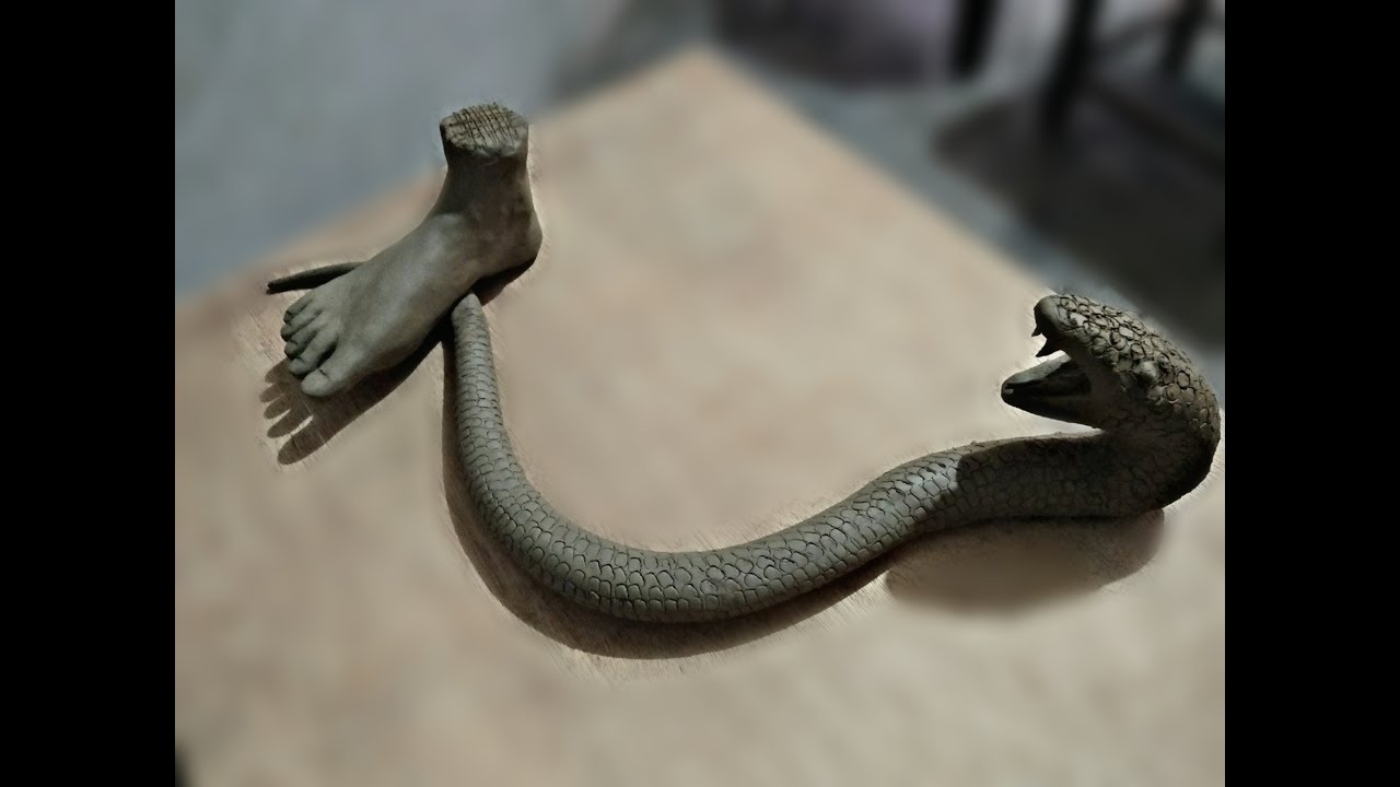 clay snake sculpture