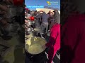 Palestinian children scramble to find scraps of food