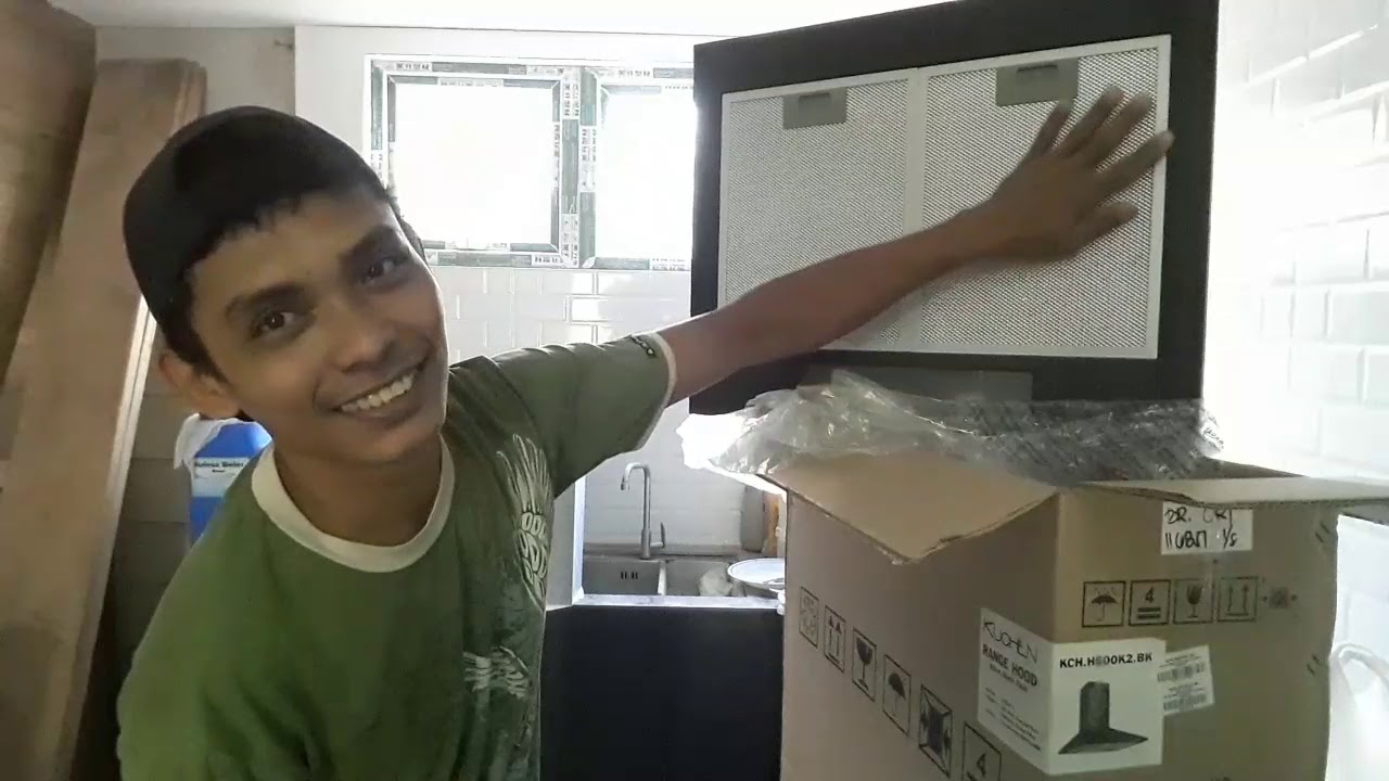 Range hood unboxing and installation with extra man
