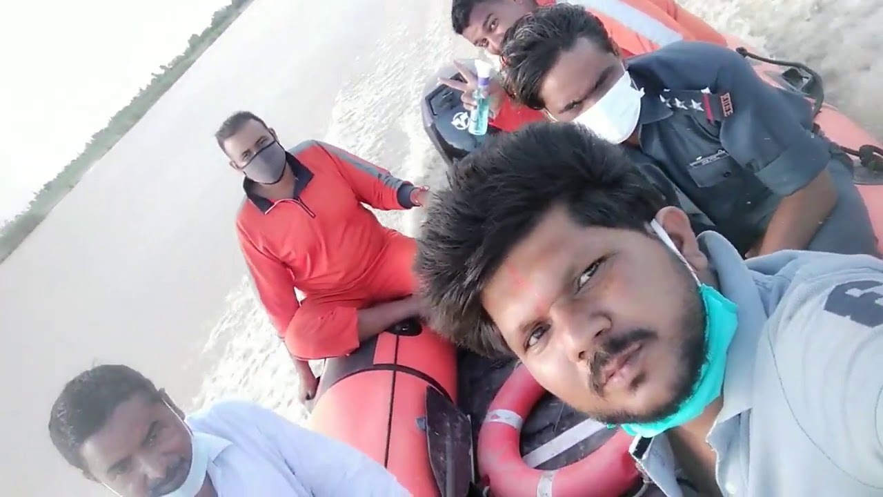 NDRF personnel searching for missing youth in the Ghagra river in Biswan