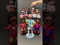 Messi leads handmade clay bobbleheads, all smiling and nodding together. #Messi