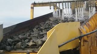 From the top of vibrating screen run into jaw crusher.in operation.