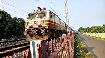 Parallel race between sairang-kolkata express and EMU local!