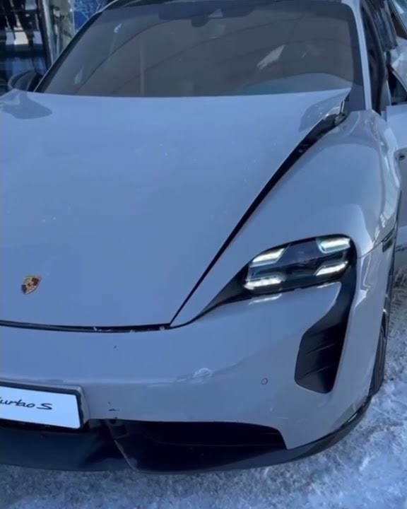 $200,000 Porsche Taycan smashes through window!