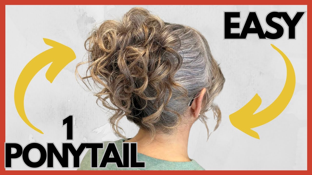 Простая прическа «высокий кудрявый пучок» для волос средней и длинной длины.