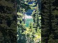 Sun seen glinting off an alpine lake through the mountain forest. #nature #lake