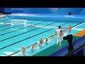 Water polo team members jumped into the water in formation
