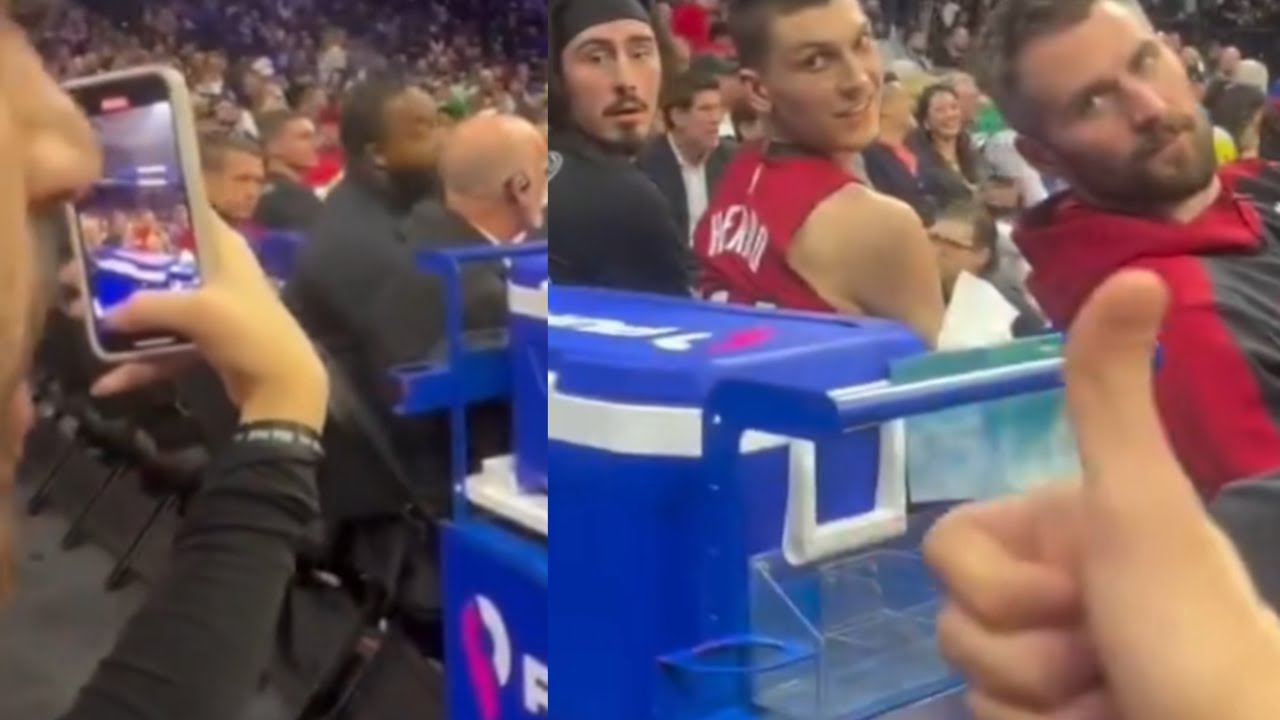 A fan tells Kevin Love & Heat bench about Jimmy Butler trade"We ROBBED Warriors! Jimmy Butler GOONE!