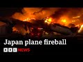 Japan Airlines fireball: passenger videos record their miracle escape | BBC News