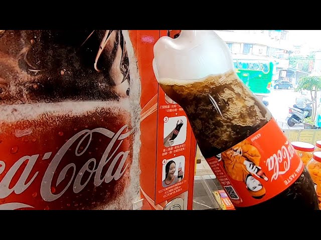 The Coke machine, which turns an extra-cold bottle of Coca-Cola