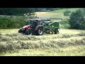 Heuernte 2014 Rundballenpressen mit Case Jxu 115 und John Deere 575