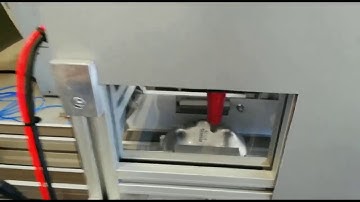 Production line-integrated ADP machine marking on fire estinguisher bases