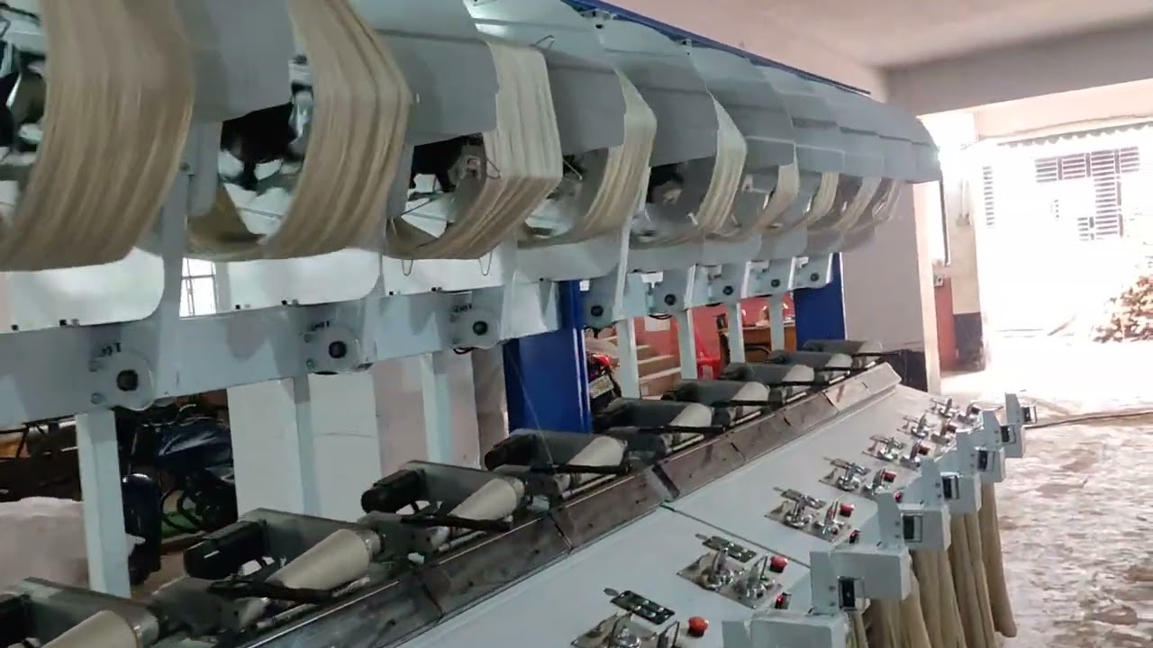 Yarn Hanks to Cone Machine.