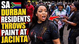 SA JACINTA CR!ES FOR HELP AS DURBAN RESIDENTS THROWS PAINT AT HER AND MARCH AND MEMBERS